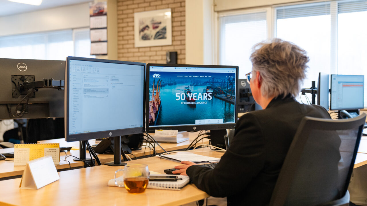 Krista working at her desk